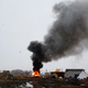 A building burns after it was set alight by protesters preparing to evacuate the main opposition camp against the Dakota Access oil pipeline near Cannon Ball, North Dakota, Feb. 22. (Reuters/Terray Sylvester)